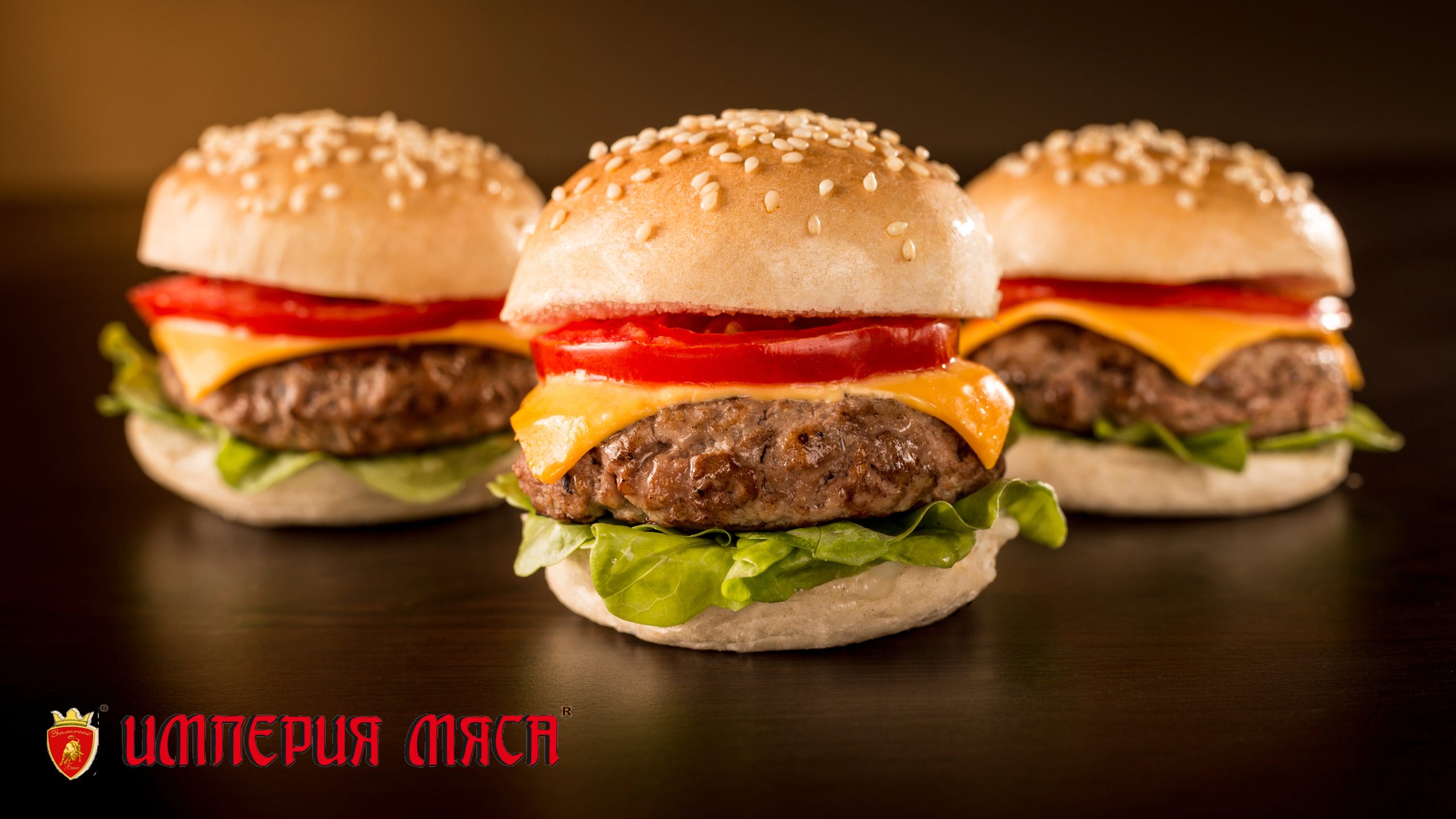 Three mini burgers in a dark ambient